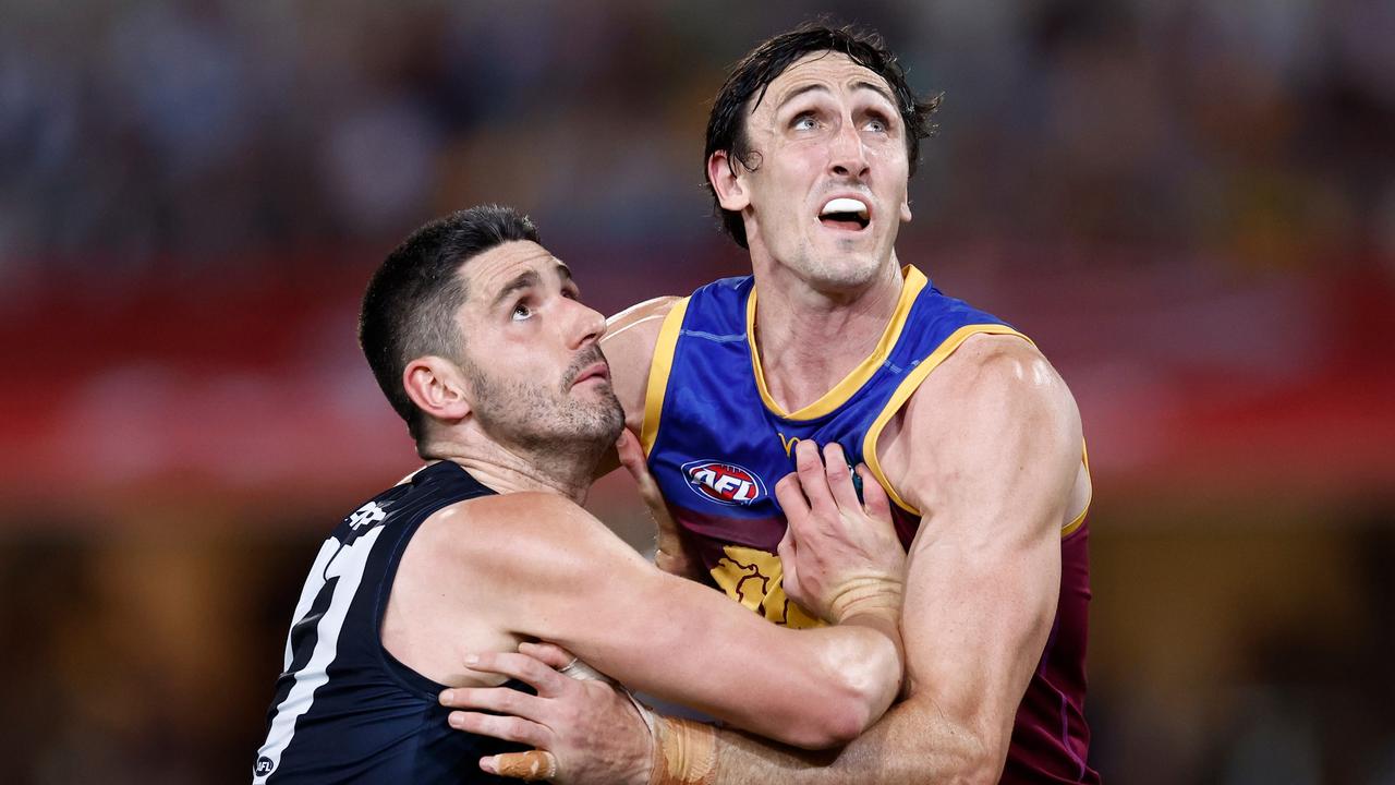 Oscar McInerney (right), pictured with Carlton’s Marc Pittonet, is set to make his 150th AFL appearance on Saturday night. Picture: Michael Willson/AFL Photos via Getty Images