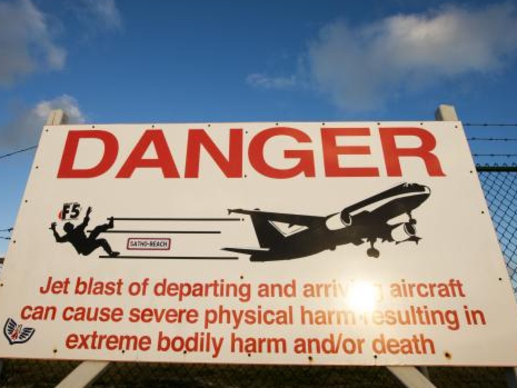 A warning sign close to the runway at Princess Juliana International Airport. Picture: Getty Images