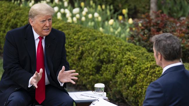 President Donald Trump talks with host Bill Hemmer during a Fox News virtual town hall. Picture: AP