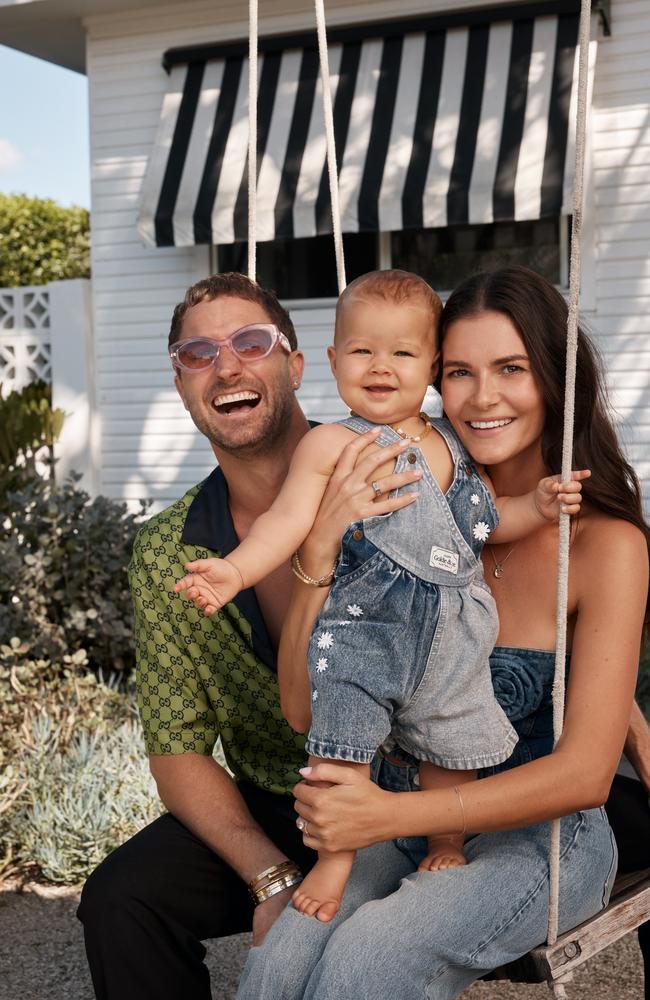 It started with a ‘nod’! DJ Fisher and Chloe Fisher with their daughter, Bobbi. Picture: Christopher Ferguson for Stellar