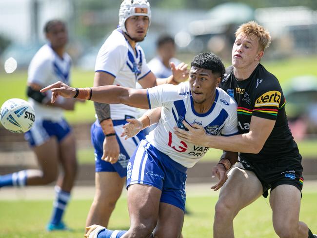 17/02/2024. News Local. Sport. Windsor, Sydney, NSW, Australia.NSWRL Junior Reps, SG Ball Cup round three, Penrith Panthers  v Canterbury Bankstown Bulldogs at Windsor Sports Complex, Windsor, 17 February 2024The game finished tied at 22-22Pic shows:Panthers player: Bulldogs player:  Sosaia Alatini gets a pass awayPicture: Julian Andrews