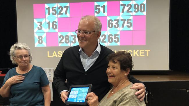 Scott Morrison with bingo winner Maria Stella Sant.