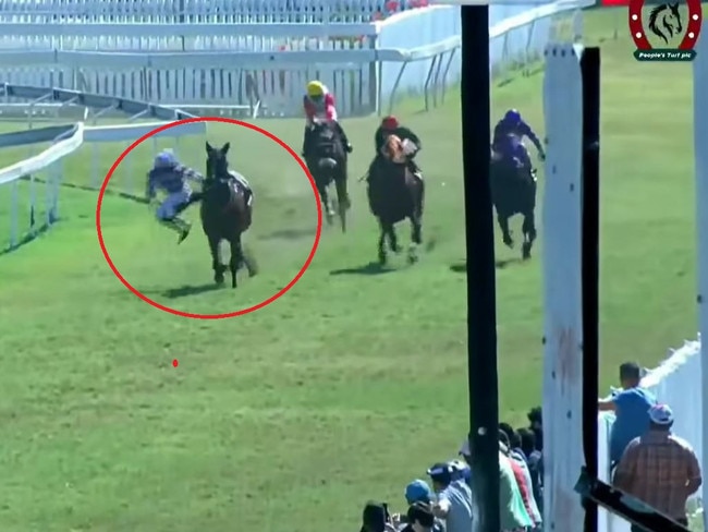 A jockey appears to jump off his horse as it hits the lead. Picture: Facebook