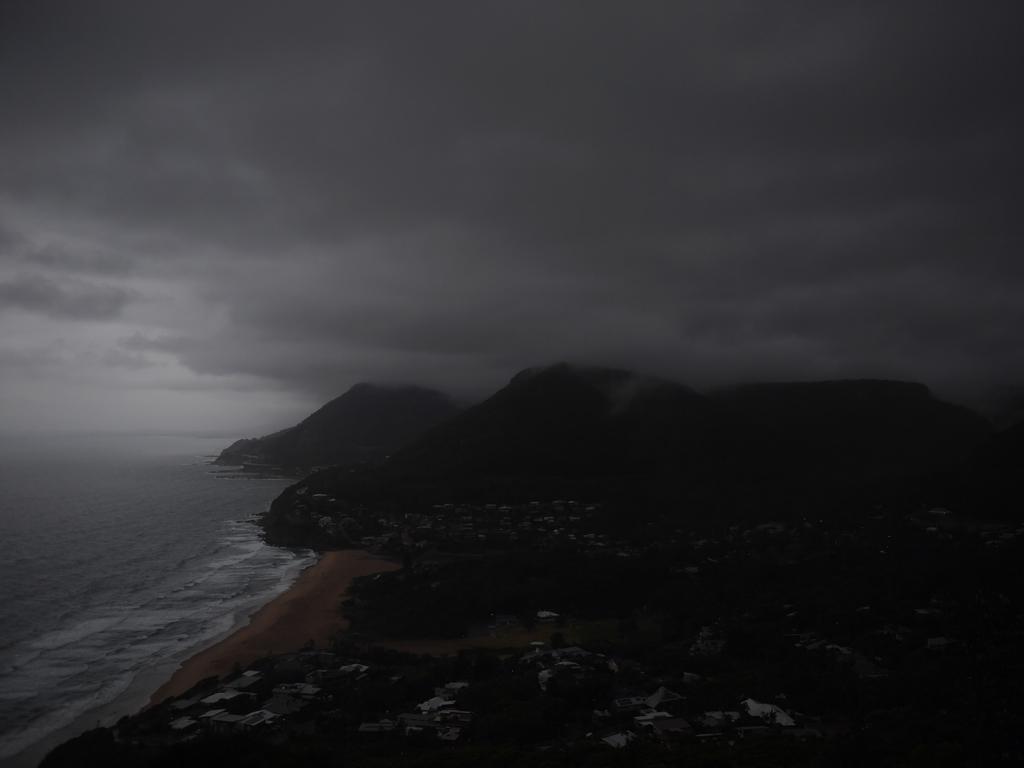 Storm clouds move over the Illawarra south of Sydney, Wednesday, November 28, 2018. Sydney received more than a month's worth of rain in just two hours - with Observatory Hill recording 84.6mm by 7am. The November average is 83.8mm. (AAP Image/Dean Lewins) NO ARCHIVING