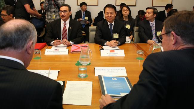 We’re all in this together: Officials from Australia, Malaysia and China take part in a trilateral meeting on MH370 in Canberra today.