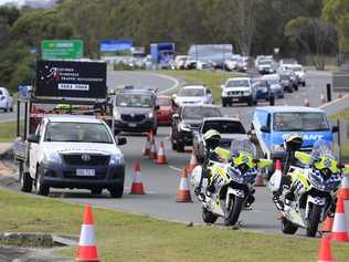 Queensland Police set up a road block due to the Corona Virus at the NSW / Queensland Border on the old Pacific Highway at Coolangatta. Photo: Scott Powick Newscorp. Picture: Scott Powick