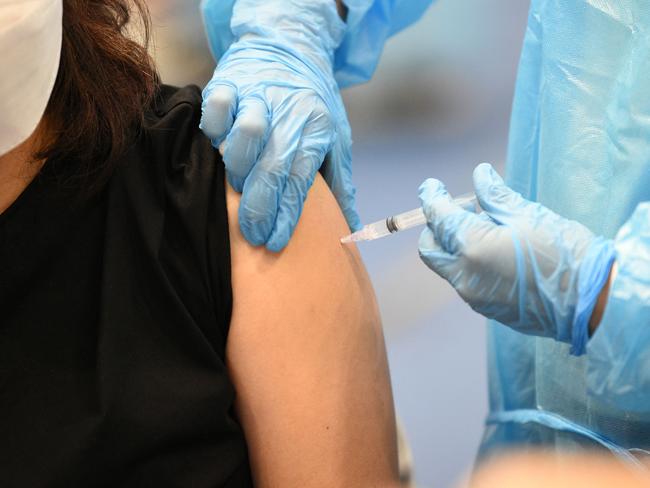 Experts expect the current vaccines will continue to provide immunity against the Omicron variant. (Photo by Ted ALJIBE / AFP)