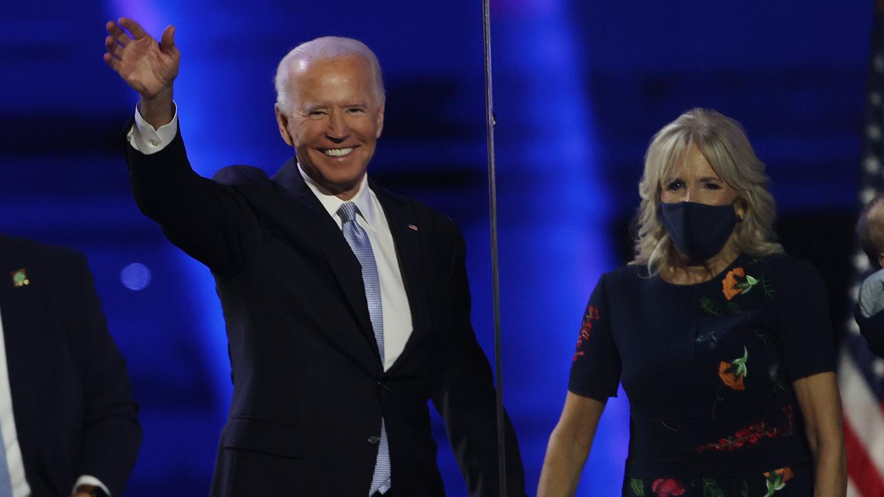 President-elect Joe Biden – pictured with wife Jill – has vowed to unify the bitterly divided country. Picture: Tasos Katopodis/Getty Images/AFP