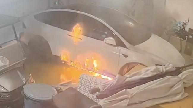 Home footage of a Tesla Model X that caught fire following a storm in the US. Photo: Supplied