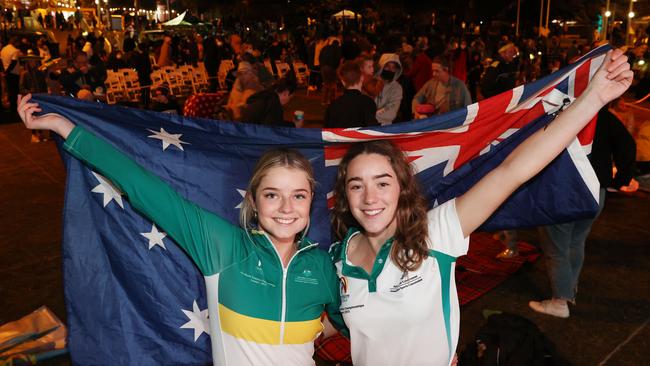 Sisters, Triathletes and 2032 Olympic hopefuls Erin and Ella Wooldridge celebrate at Kings Beach as Brisbane is announced as the host of the 2032 Olympic Games. Picture Lachie Millard