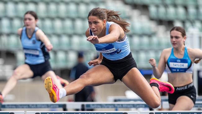 Isabelle Louison-Roe om the 100m hurdles.