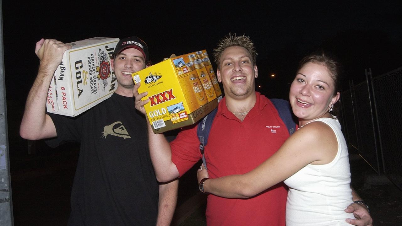 Luke Sorensen, Ryan Oliver and Christie Sirl of Morayfield at the Mooloolaba new years eve celebrations in 2003. Photo Barry Leddicoat