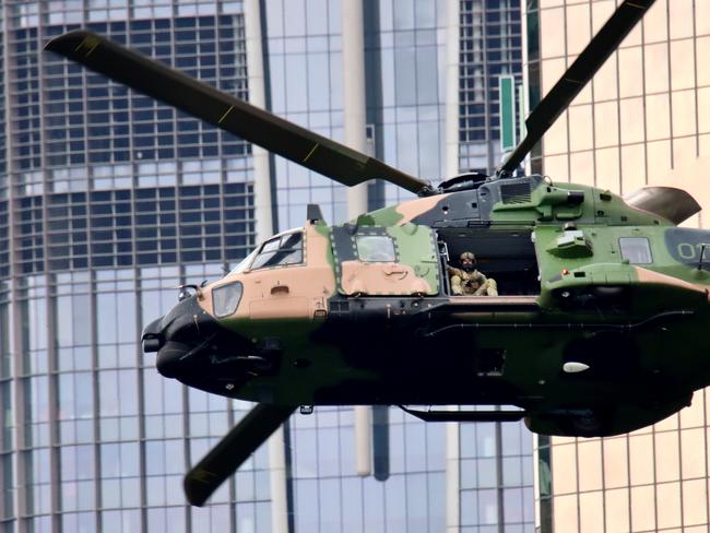 An MRH-90 Taipan battlefield mobility helicopter flies in Brisbane in September, 2022. Picture David Clark.