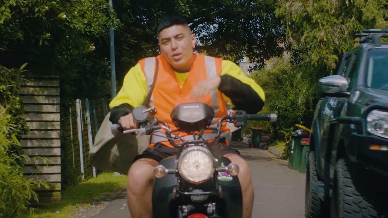 Hooligan Hefs riding a postie bike in the video clip for his massive song "Send It".