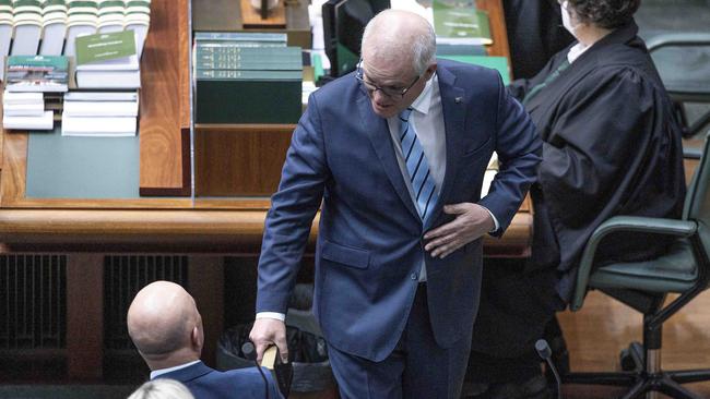 Mr Morrison shook hands with his Liberal leader successor – Peter Dutton – after being sworn in. Picture: NCA NewsWire / Gary Ramage