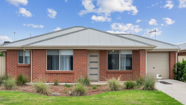 This three-bedroom house at 24 Clare Mews, Munno Para West is on the market with a price guide of $379,000 to $409,000.