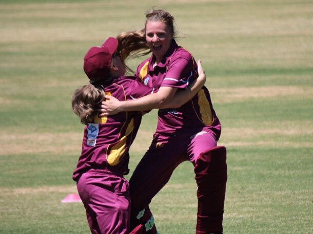 Tori Russell (left) being embraced by Skye skipper Stacey Dorbolo.