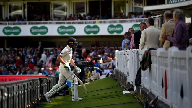 England’s Jos Buttler leaves the field after being dismissed by Peter Siddle at Lord’s. Picture: Getty Images