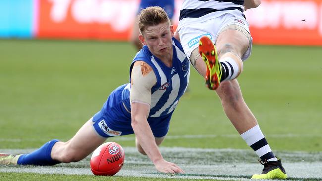 Jack Ziebell spent time off the ground after cutting his knees on the LED lights at GMHBA Stadium. Picture: Michael Klein