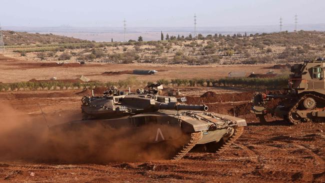 An Israeli Merkava tank takes part in a military drill near the border with Lebanon. Picture: AFP