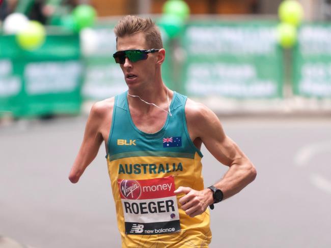 T67DY6 Paralympic athlete,  Michael Roeger, (AUS), competing in the 2019   London Marathon. He finished first in the  T45/46 Category, in a time of  02:22:51