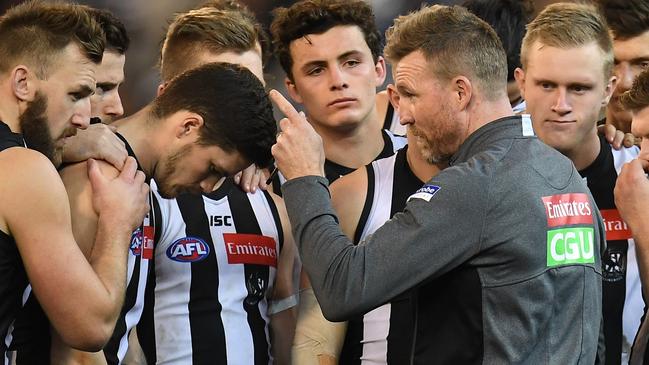 Nathan Buckley eyeballs his players during 2018.