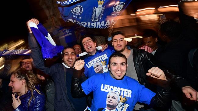 Leicester City fans celebrate their team becoming the English Premier League champions.