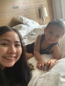 Ha Phung and her son, Sam, 3, in the Pan Pacific Hotel.