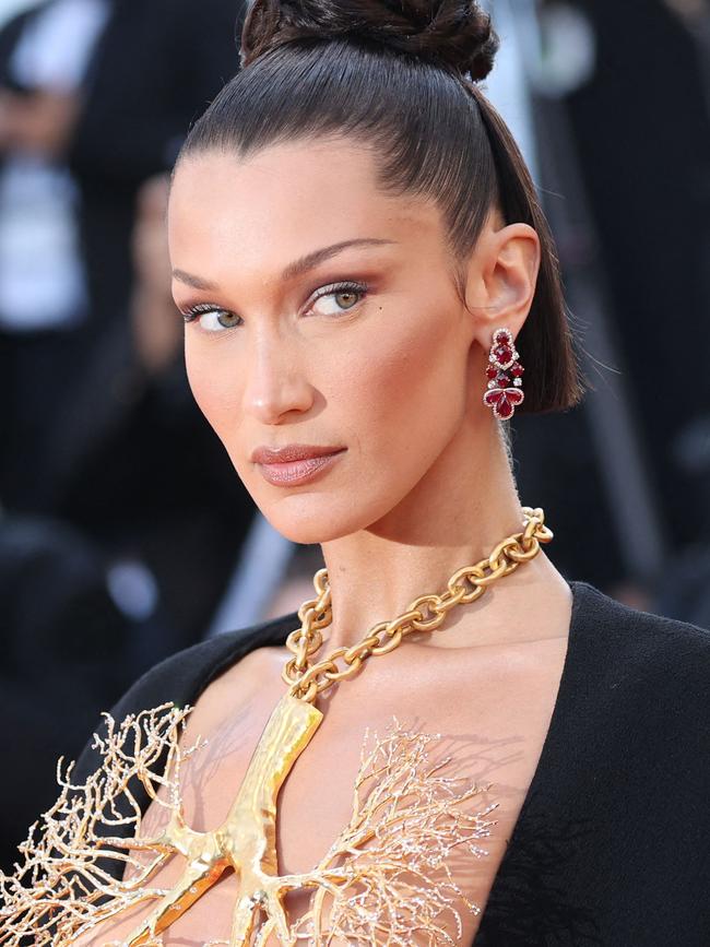 Bella Hadid shows off the straight eyebrows trend known as ‘fox eye’. Picture: ACHE / AFP