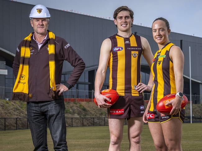 Hawthorn president Andy Gowers with Will Day and Jas Fleming at the new Kennedy Community Centre. Picture: Jake Nowakowski