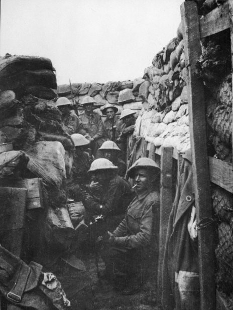 Men of the 53rd Battalion waiting to don their equipment for the attack at Fromelles on July 19, 1916. Only three of the men shown here came out of the action alive, and those three were wounded.