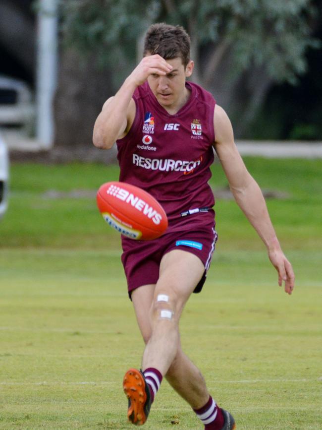 Jack Trengove gets a kick away on Saturday. Picture: Brenton Edwards