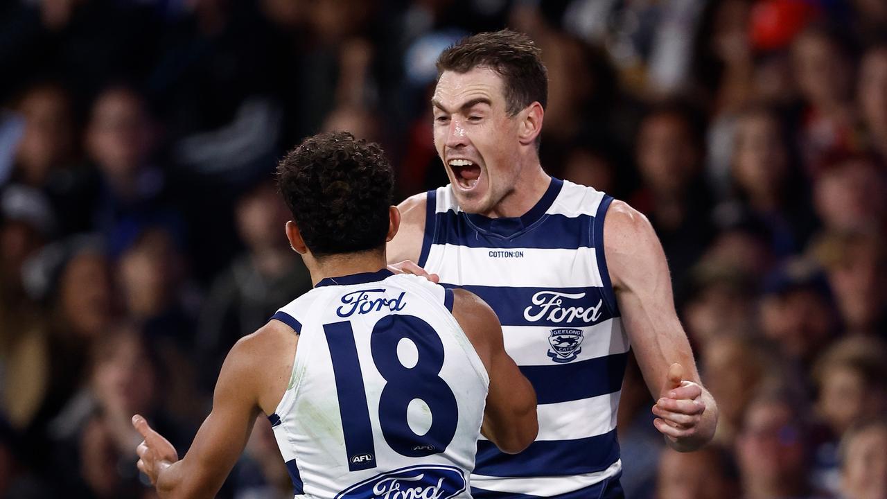 Tyson Stengle and Jeremy Cameron celebrate a goal. Picture: Michael Willson/AFL Photos via Getty Images