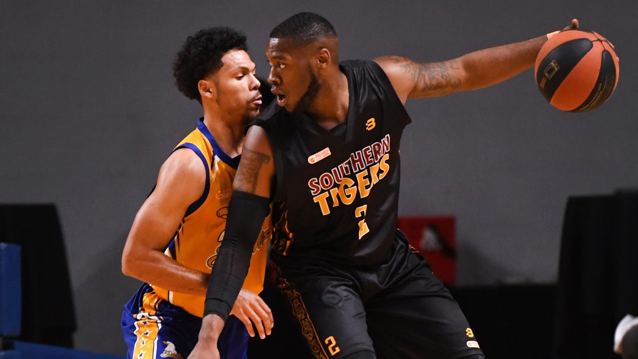 Jalen Richard of the Eagles defends CJ Turnage of the Tigers during the Men's Premier League basketball grand final between Southern Tigers and Forestville at Titanium Securtity Arena Saturday August 18,2018.(Image AAP / Mark Brake)