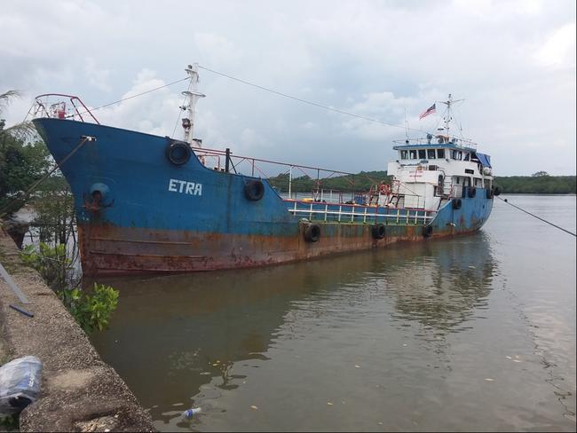 This May 5, 2018, photo,  released by the Royal Malaysian Police shows a rusty tanker near Kota Tinggi in Johor state, Malaysia. Malaysian police have intercepted the tanker with 131 Sri Lankans believed bound for Australia and New Zealand, smashing a large human smuggling ring that has been operating for over a year. (Royal Malaysia Police via AP)