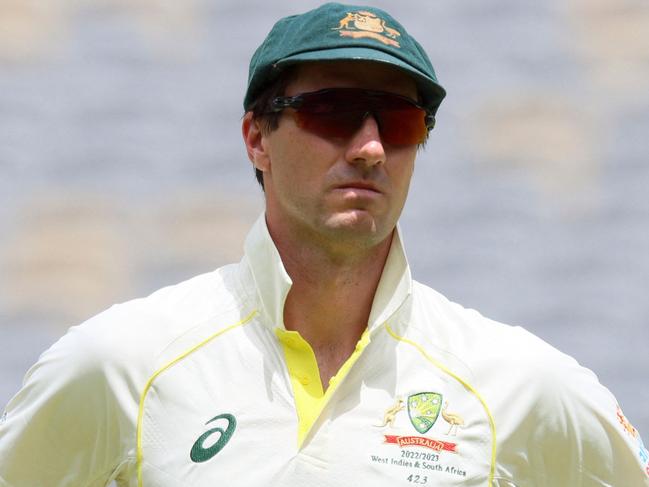 Australia's captain Pat Cummins looks on during the fifth day of the first Test cricket match between Australia and the West Indies at Perth Stadium in Perth on December 4, 2022. (Photo by TREVOR COLLENS / AFP) / -- IMAGE RESTRICTED TO EDITORIAL USE - STRICTLY NO COMMERCIAL USE --