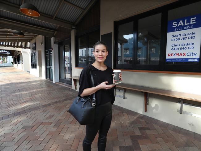 Susi Mayer from Gold Coast. Empty shop fronts in New Farm on Brunswick St. Picture: Annette Dew