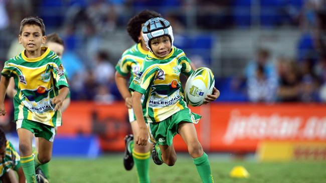 Gold Coast Titans Vs Canterbury Bulldogs from Skilled Park, Robina - Jayden Campbell son of Titans Preston Campbell playing at half time