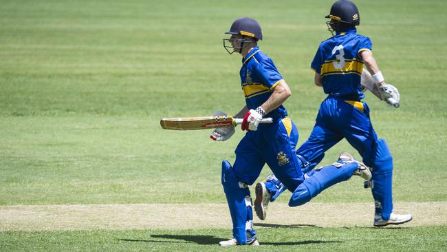 Hedley Donges (left) and Fraser Judd make runs for Toowoomba Grammar School.