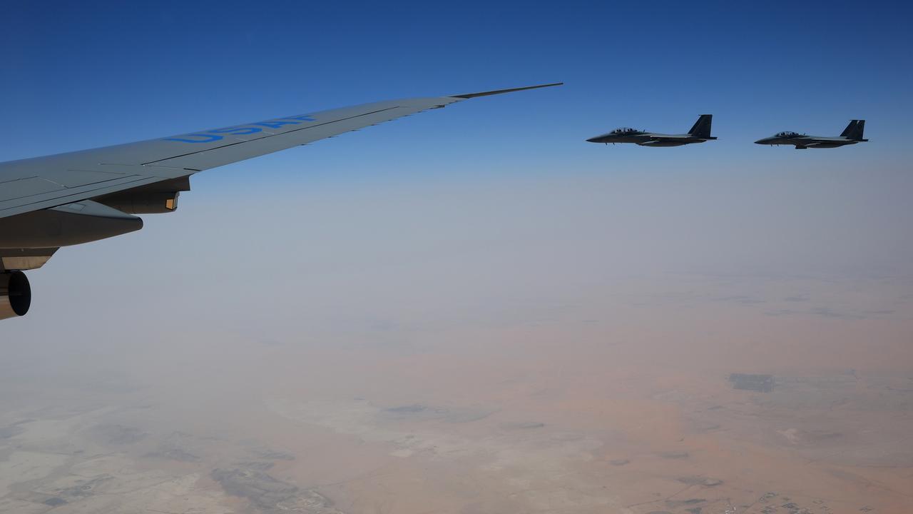 F-15SA fighter jets from the Royal Saudi Air Force escort Air Force One ferrying Donald Trump as they prepare to land at King Khalid International Airport. Picture: Getty Images
