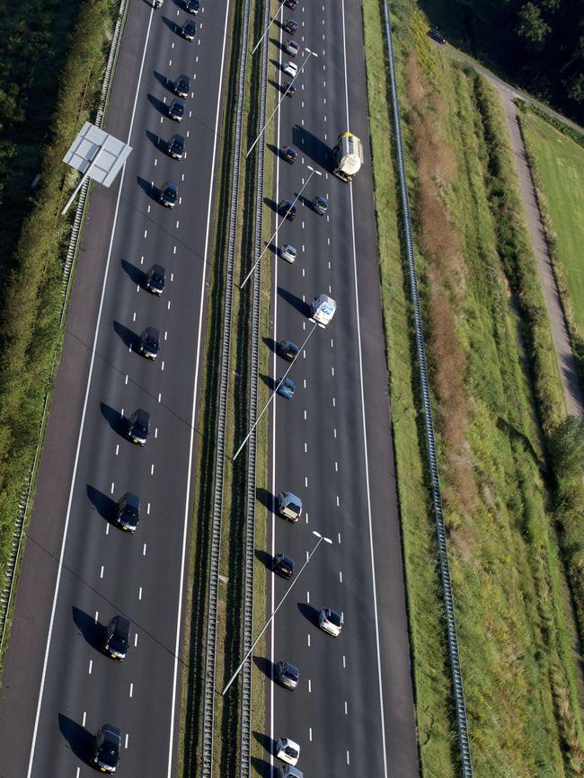 The convoy of hearses carries the bodies of victims of the downed Malaysia Airlines flight MH17. Picture: AFP Photo/ANP/Jerry Lampen