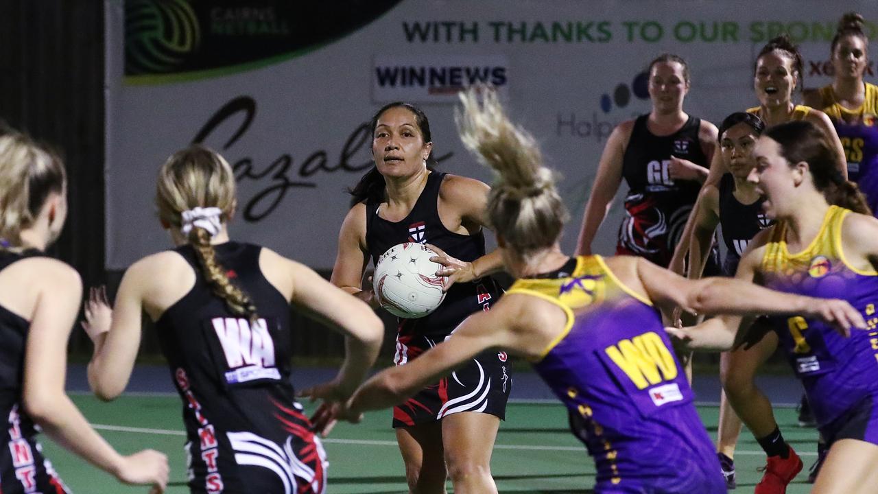 Saints' Moera Blair looks to pass the ball in the Cairns Netball Association Senior Division 1 match between the Phoenix Fierce and the Cairns Saints. PICTURE: BRENDAN RADKE