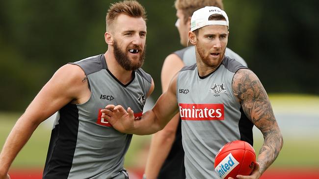 Lynden Dunn and Jeremy Howe at Collingwood training.