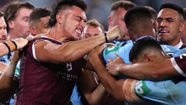 Tino Fa'asuamaleaui and Payne Haas are caught up in a scuffle during game two of the 2020 State of Origin series.