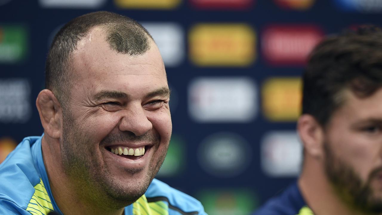 Australia's head coach Michael Cheika (L) and Australia's wing Adam Ashley-Cooper (R) deliver a press conference on October 2, 2015 at Twickenham Stadium in southwest London, on the eve of their 2015 Rugby Union World Cup match against England. AFP PHOTO / MARTIN BUREAU RESTRICTED TO EDITORIAL USE