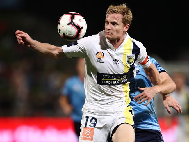Matt Simon of the Mariners controls the ball during the Round 11 A-League match between the Sydney FC and the Central Coast Mariners at Jubilee Stadium in Sydney.