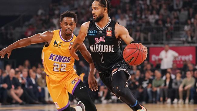 Melbourne United’s Melo Trimble drives past Sydney Kings’ Caspar Ware on Monday night. Picture: AAP