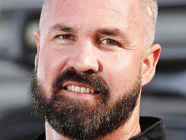 Senior Constable Aaron Izzard posing at Public Safety Response Team (PSRT), Brisbane 2nd of July 2019.  Aaron was critically injured and on life support in September last year.  (AAP Image/Josh Woning)