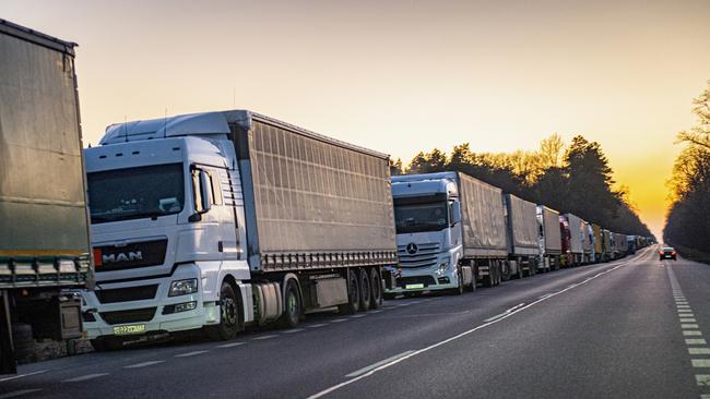 Ukrainian protesters on Sunday block trucks at the Kukuryki border heading to Belarus, causing a 20km tail back. Picture: Annabel Moeller