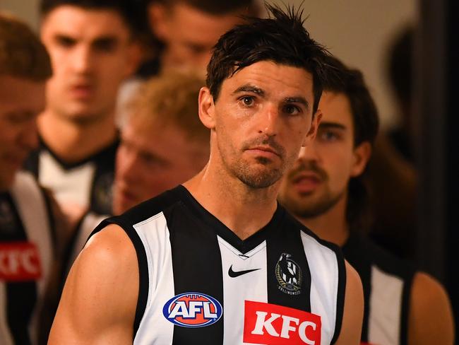 GOLD COAST, AUSTRALIA - JULY 02: Scott Pendlebury of the Magpies leads the team to the field before the round 16 AFL match between the Gold Coast Suns and the Collingwood Magpies at Metricon Stadium on July 02, 2022 in Gold Coast, Australia. (Photo by Albert Perez/Getty Images)